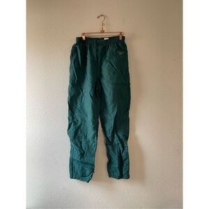 Reebok vintage women’s green nylon sweat pants size medium‎